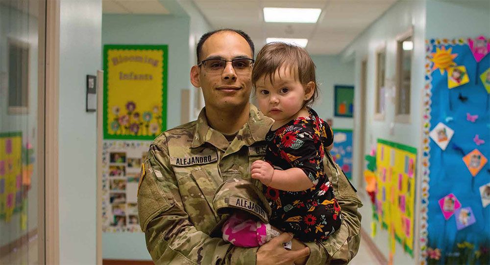 Man Holding Child
